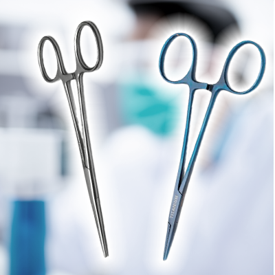 Kelly Clamps and hemostats in front of blurry lab background